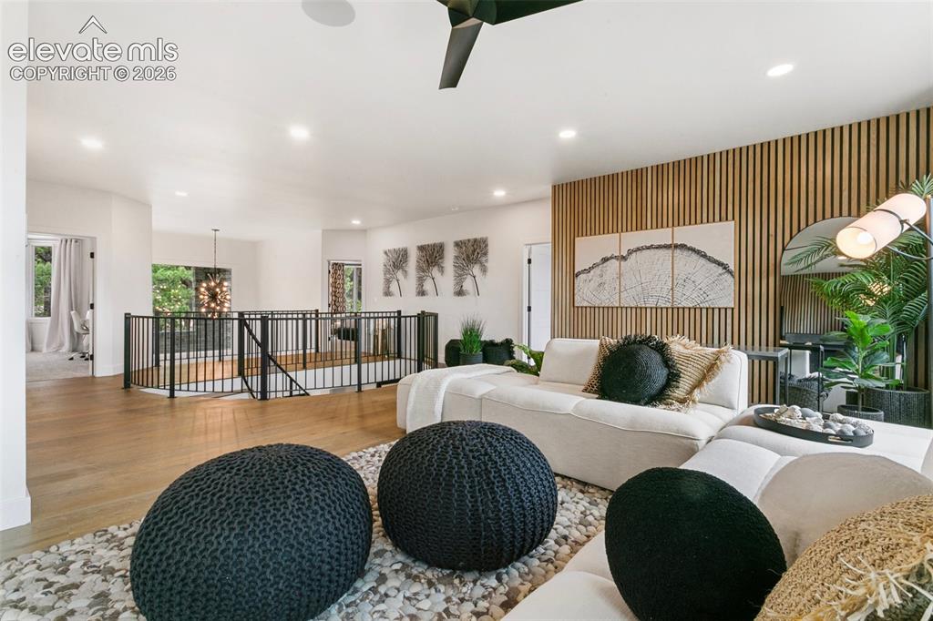 Image 23 of 49: Lounge and relax in the upper family room