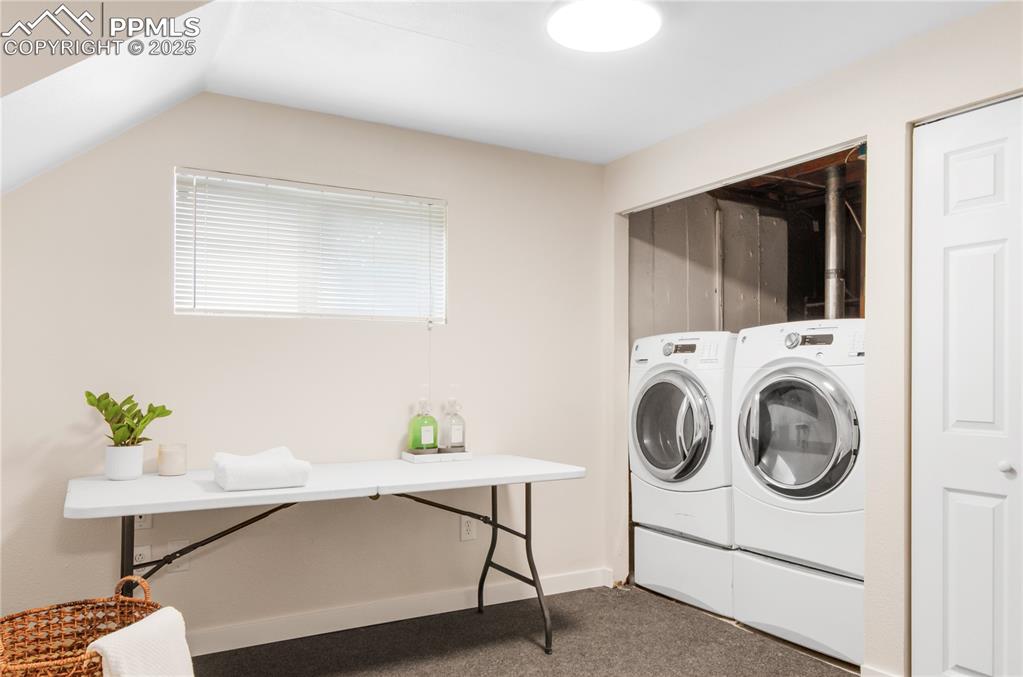 Image 22 of 25: Washroom with carpet washer & Dryer