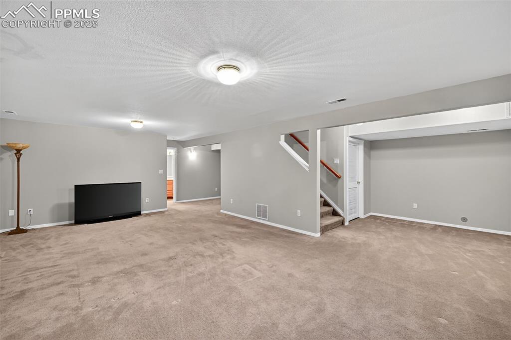 Image 27 of 41: Basement family room, TV Room 