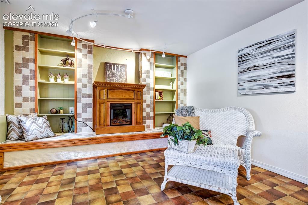Image 20 of 48: Family Room With Electric Fireplace