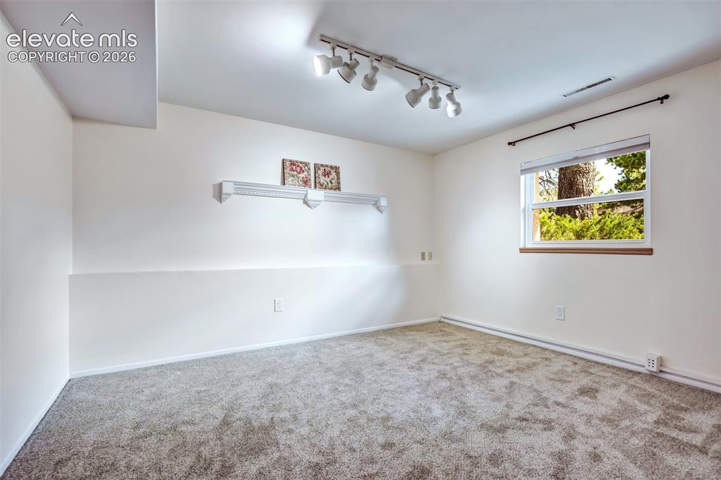 Image 32 of 48: Spacious Secondary Bedroom #4 on Lower level