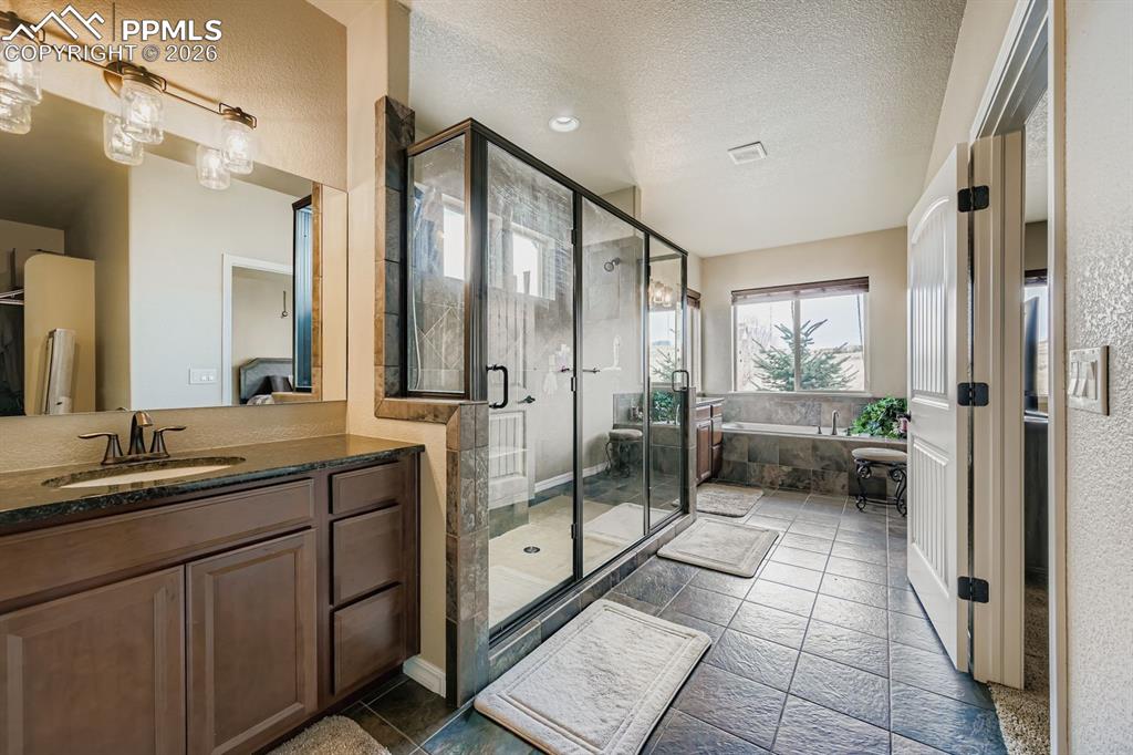 Image 14 of 36: spa like primary bath