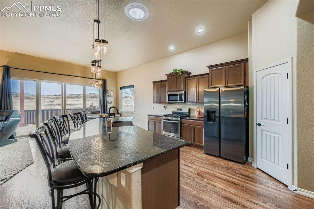 Image 7 of 36: Open, inviting cooks kitchen