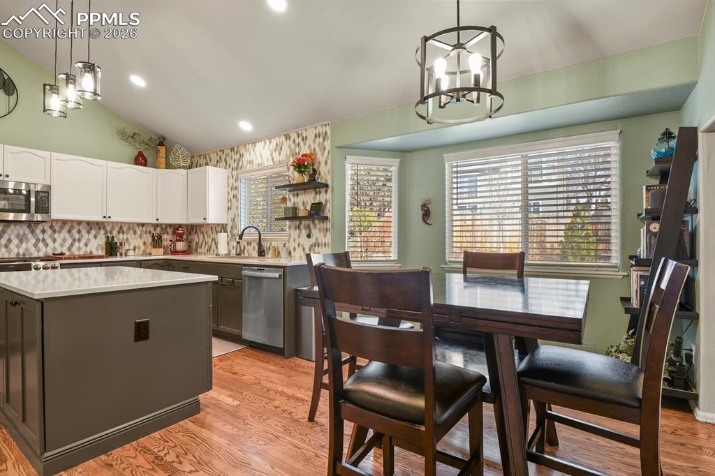 Image 15 of 43: Kitchen and dining area