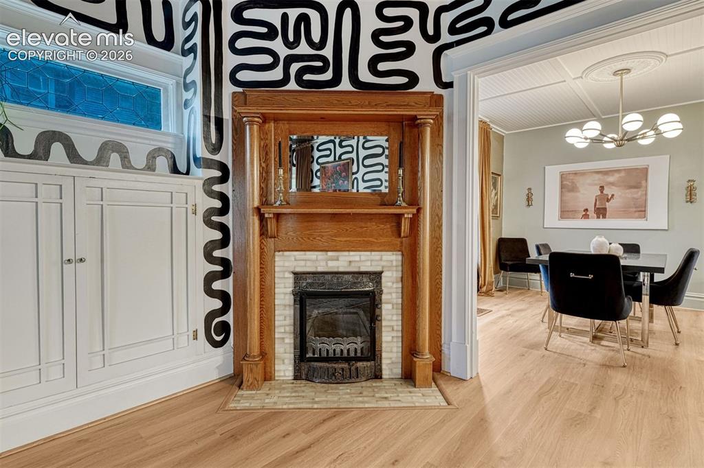 Image 16 of 50: Hardwood-style flooring throughout