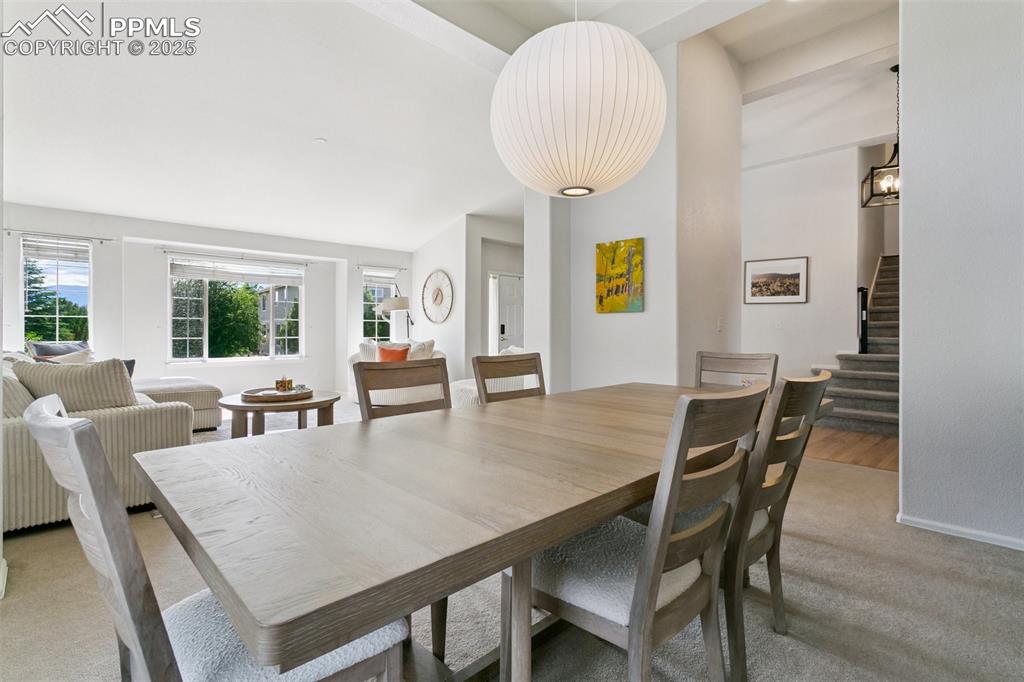 Image 11 of 41: Vaulted Ceiling showing the Herman Miller Pendant Light