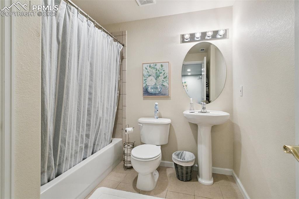 Image 32 of 41: Basement Bathrooom with closet for storage