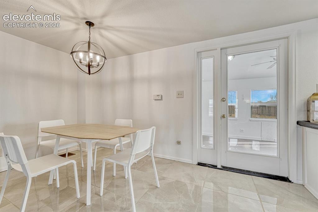Image 11 of 42: ceramic tile dining area