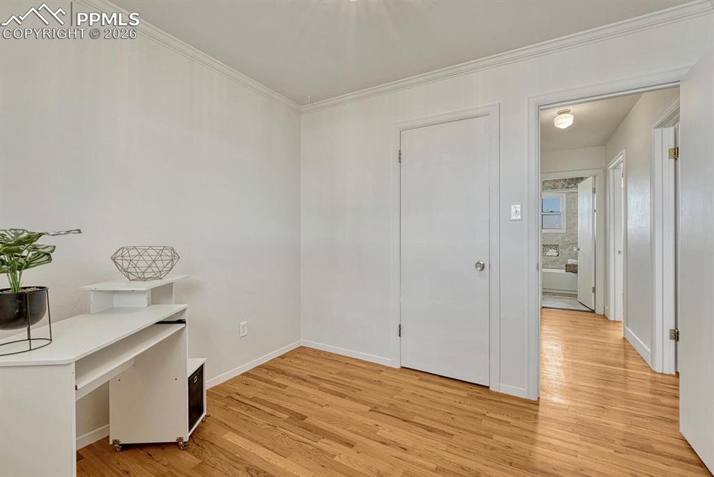 Image 23 of 42: Bedroom 3 with walk-in closet. Also faces west