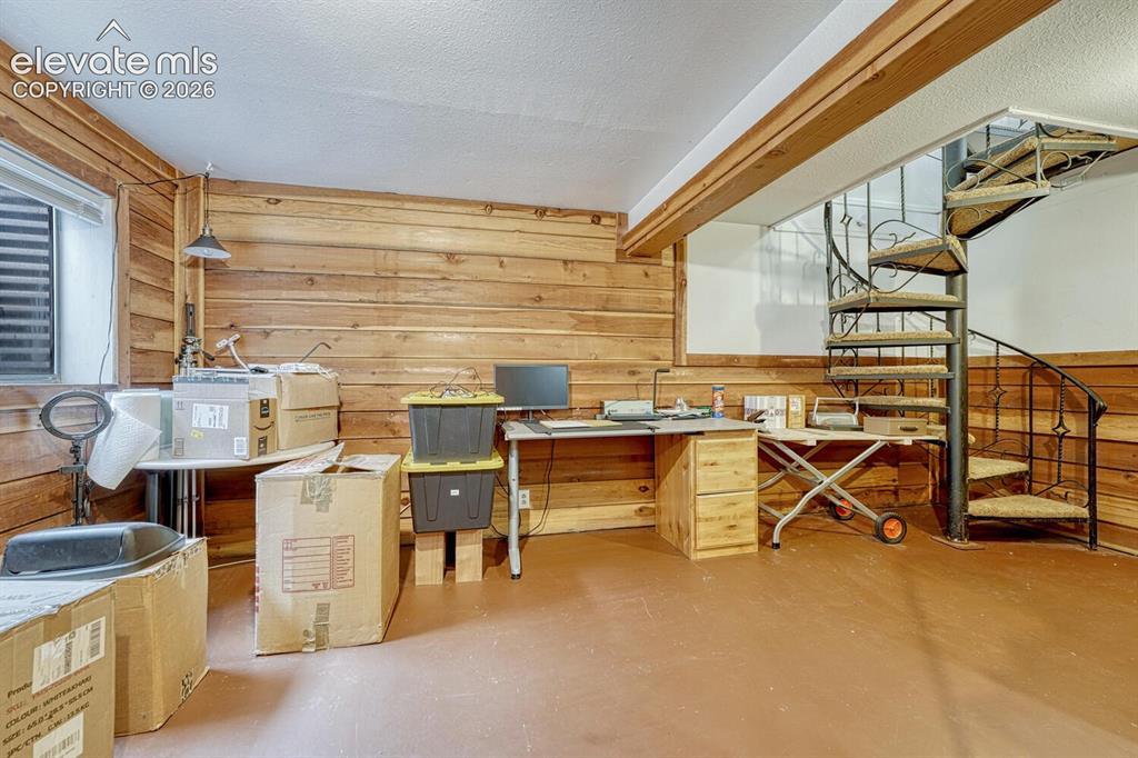 Image 28 of 42: Cedar lined basement at the bottom of the spiral staircase back in the nort