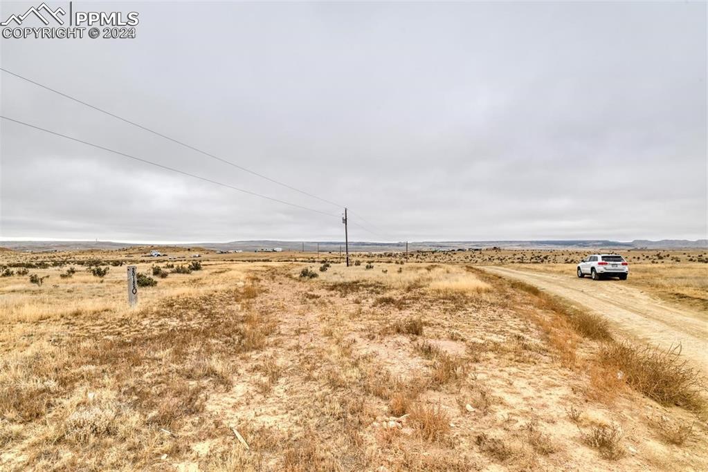 Image 22 of 25: View of street with a rural view