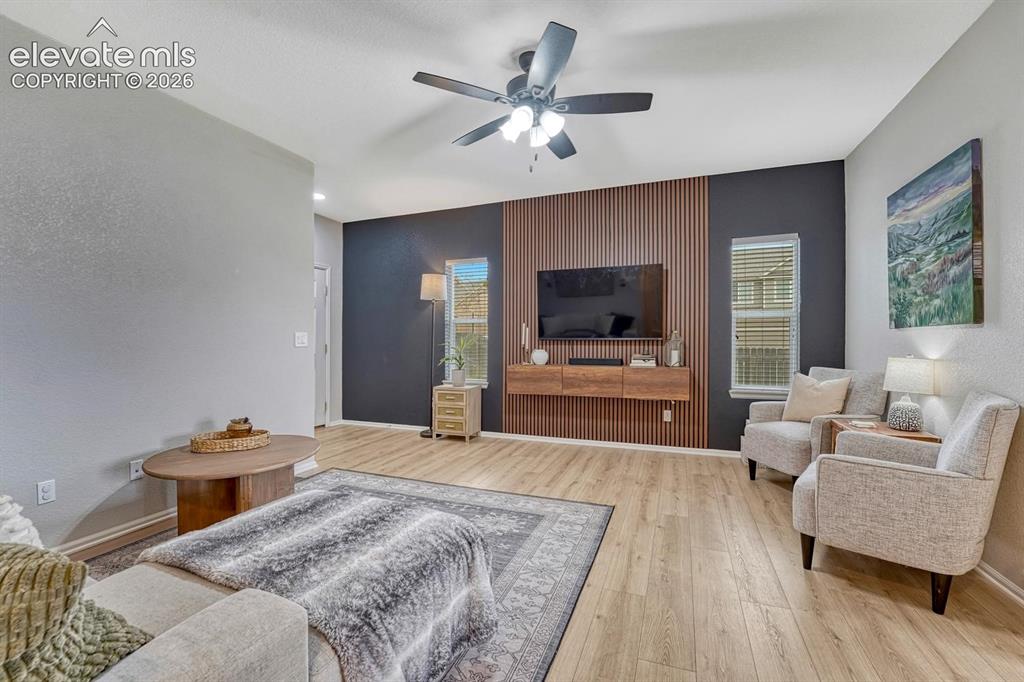 Image 13 of 50: Spacious Living Room, ideal for family gatherings and entertaining.