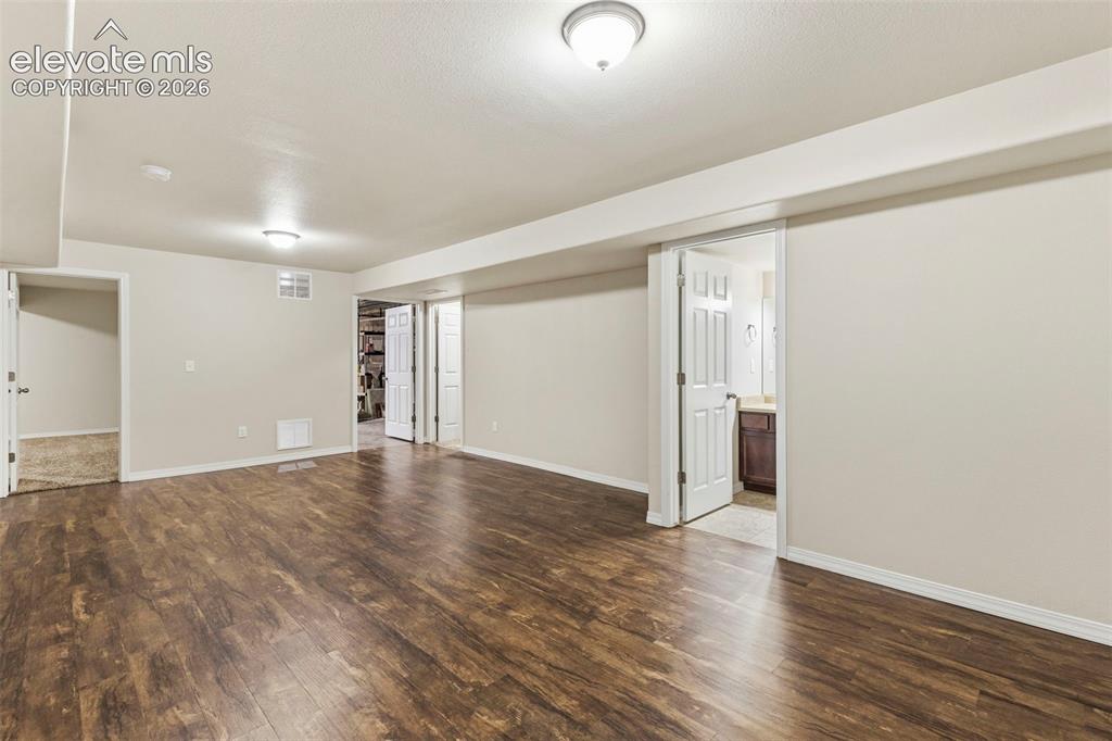 Image 25 of 48: Large basement familyroom or game room
