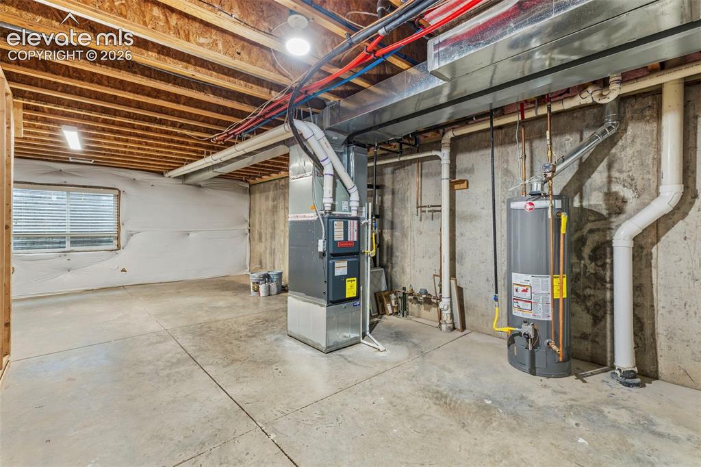 Image 35 of 48: Unfinished storage and potential