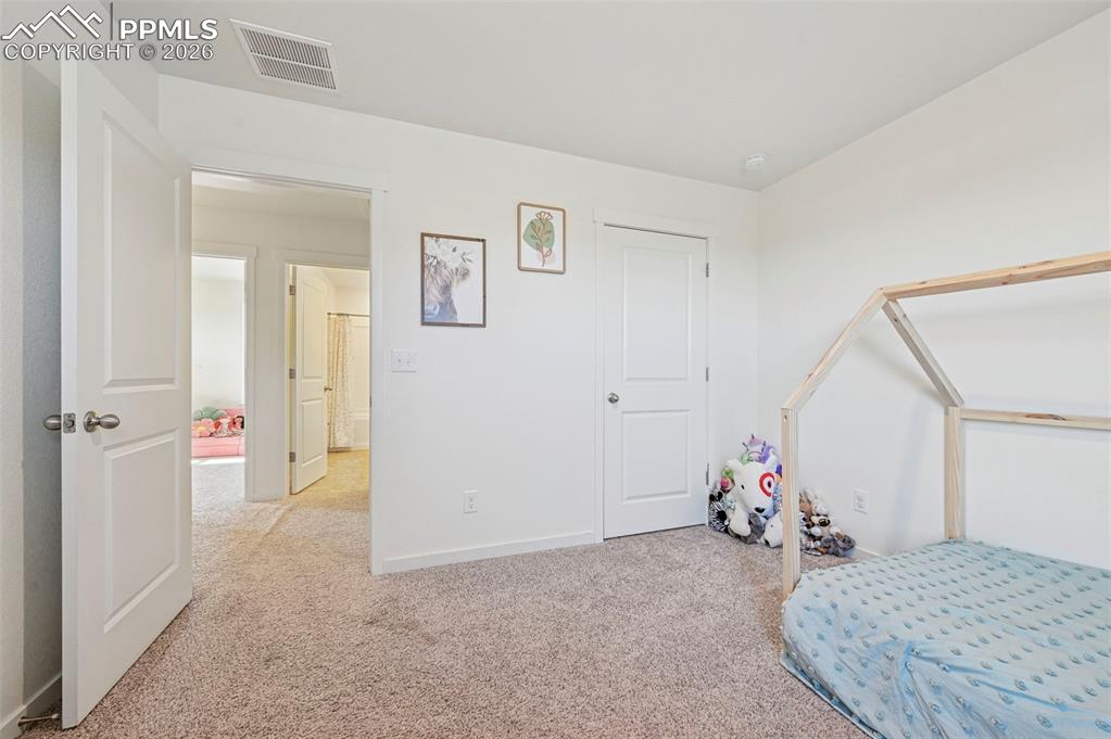 Image 28 of 40: Bedroom