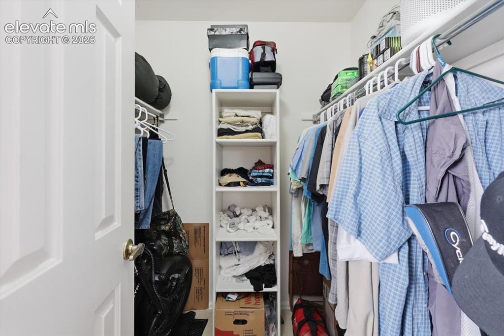 Image 17 of 39: Large walk-in closet.