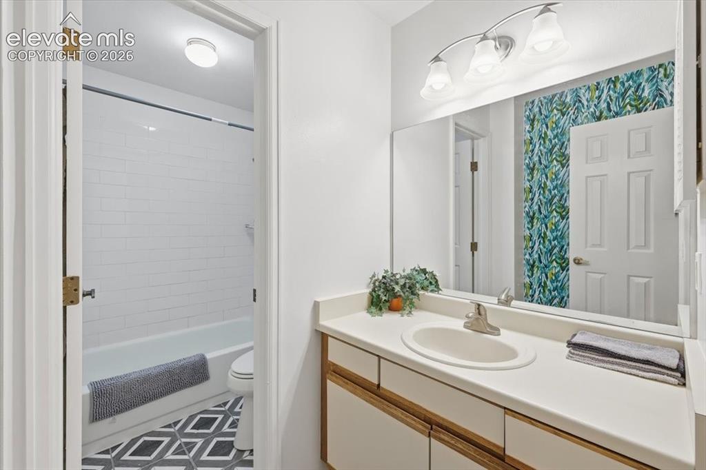 Image 18 of 39: Updated bathroom.