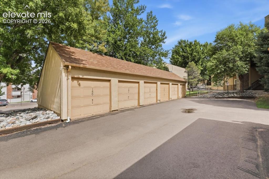 Image 36 of 39: One car garage is included.