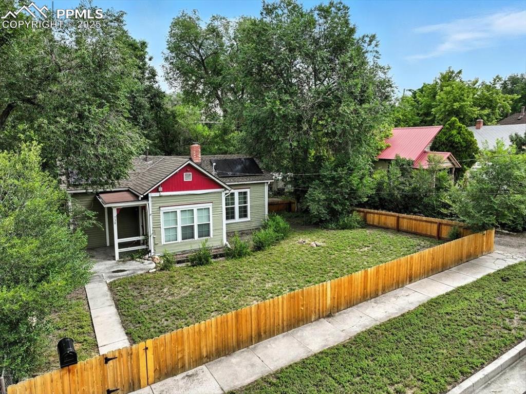 Image 3 of 36: View of fenced backyard