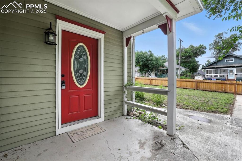 Image 6 of 36: View of exterior entry featuring a porch