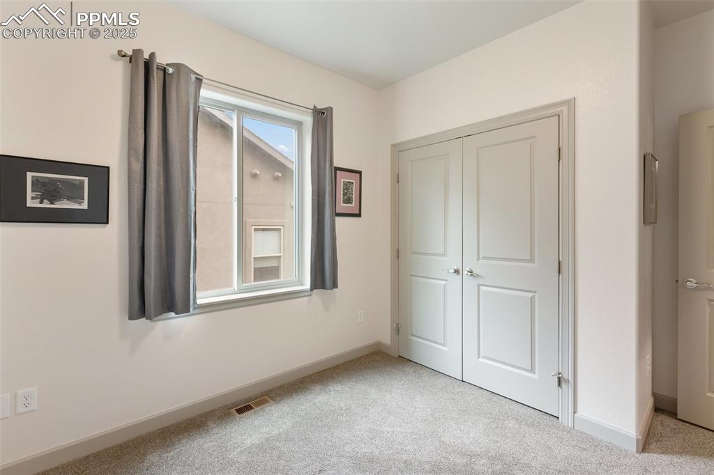 Image 30 of 38: Bedroom