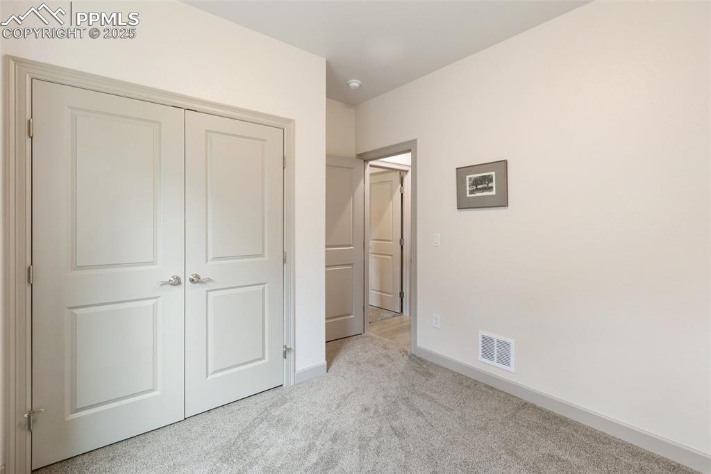 Image 31 of 38: Bedroom