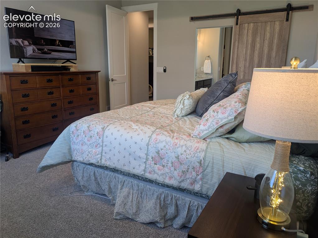 Image 18 of 47: Primary Bedroom with 5 -Piece Bathroom