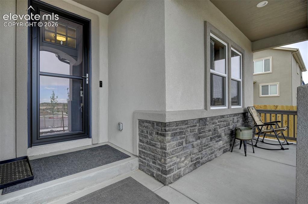 Image 2 of 47: Covered  Porch at Front Entry 