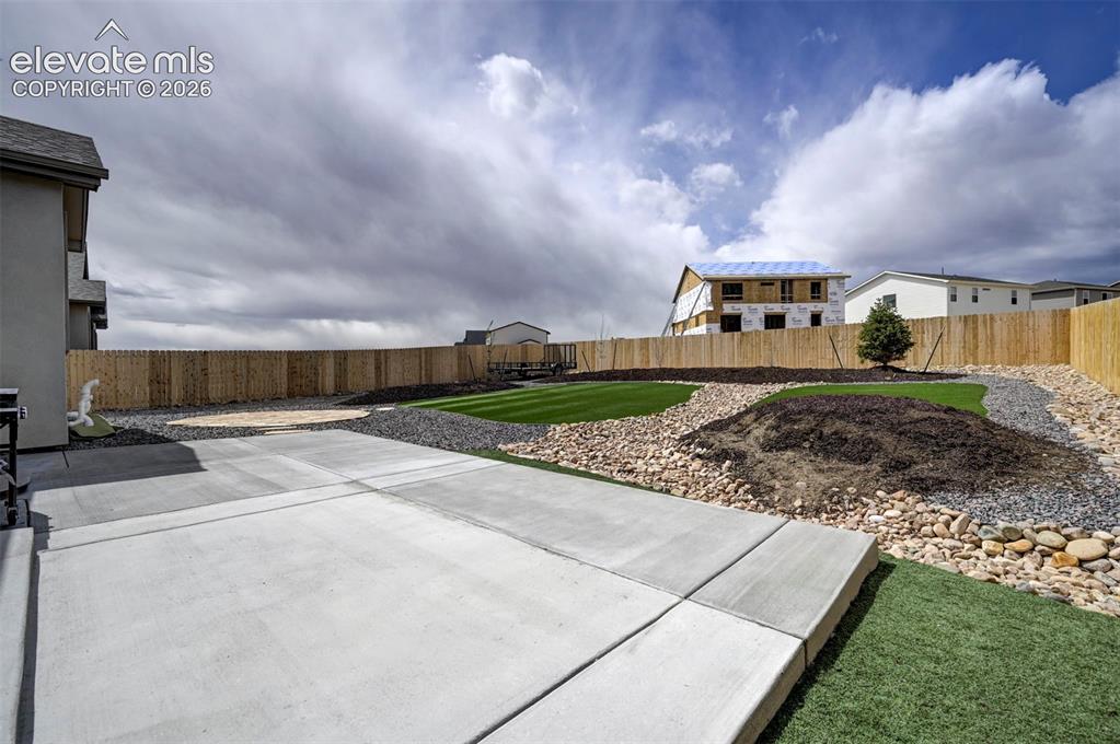 Image 40 of 47: Walkout from the dining room to the backyard
