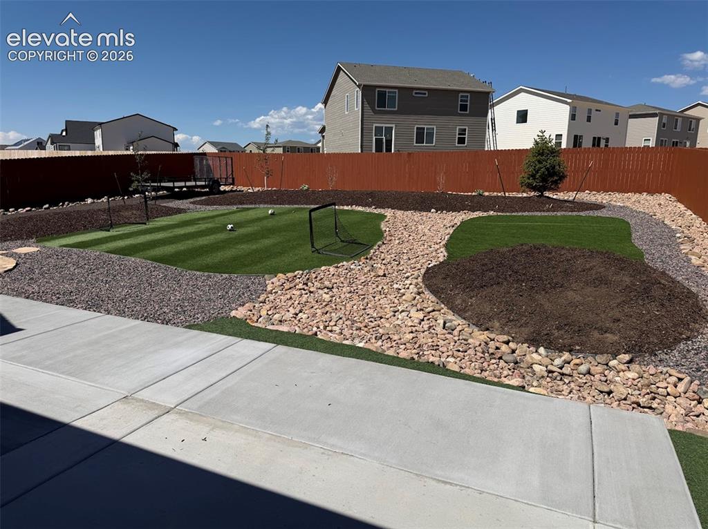 Image 41 of 47: Large extended Patio plus a firepit area
