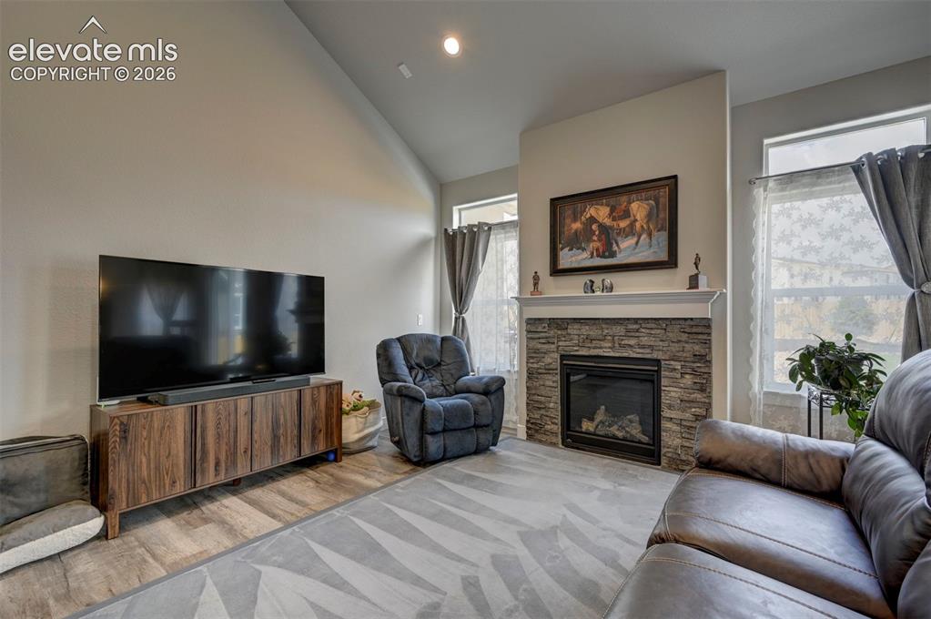 Image 9 of 47: Fireplace in the Living Room with Stone Mantle