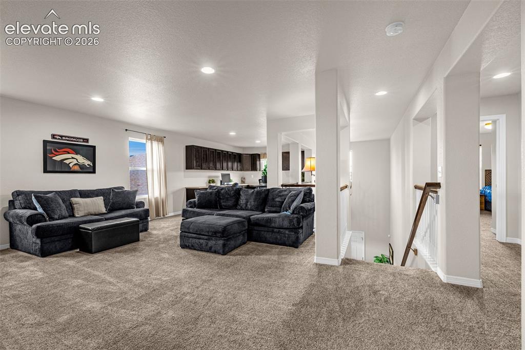 Image 16 of 42: upstairs Loft with built in office
