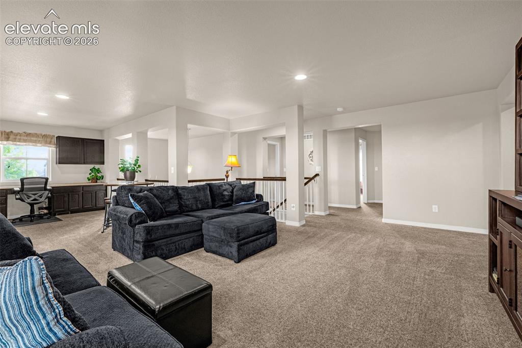 Image 19 of 42: upstairs Loft with built in office