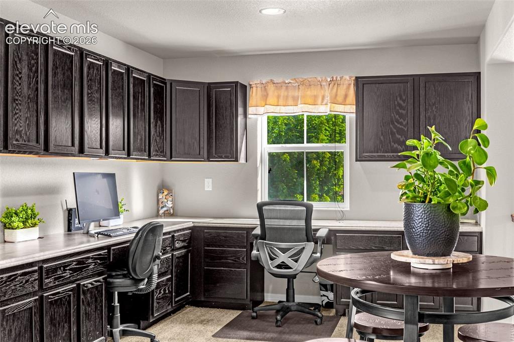 Image 20 of 42: upstairs Loft with built in office