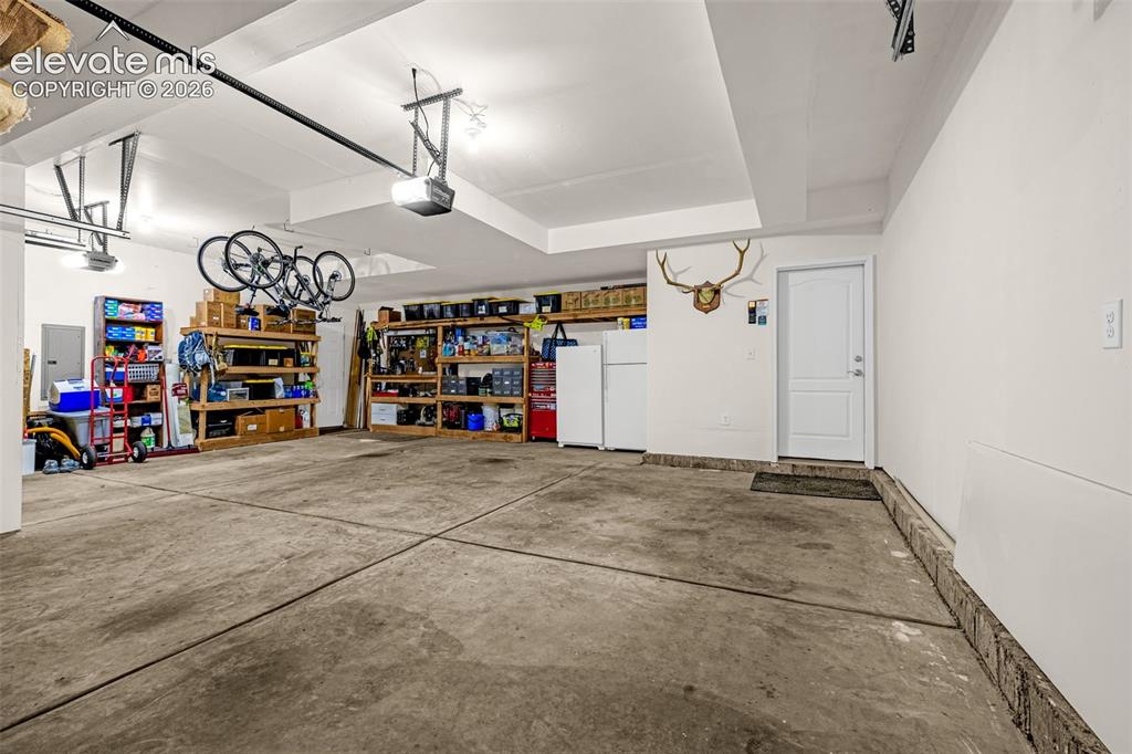 Image 34 of 42: Oversized 3 car garage