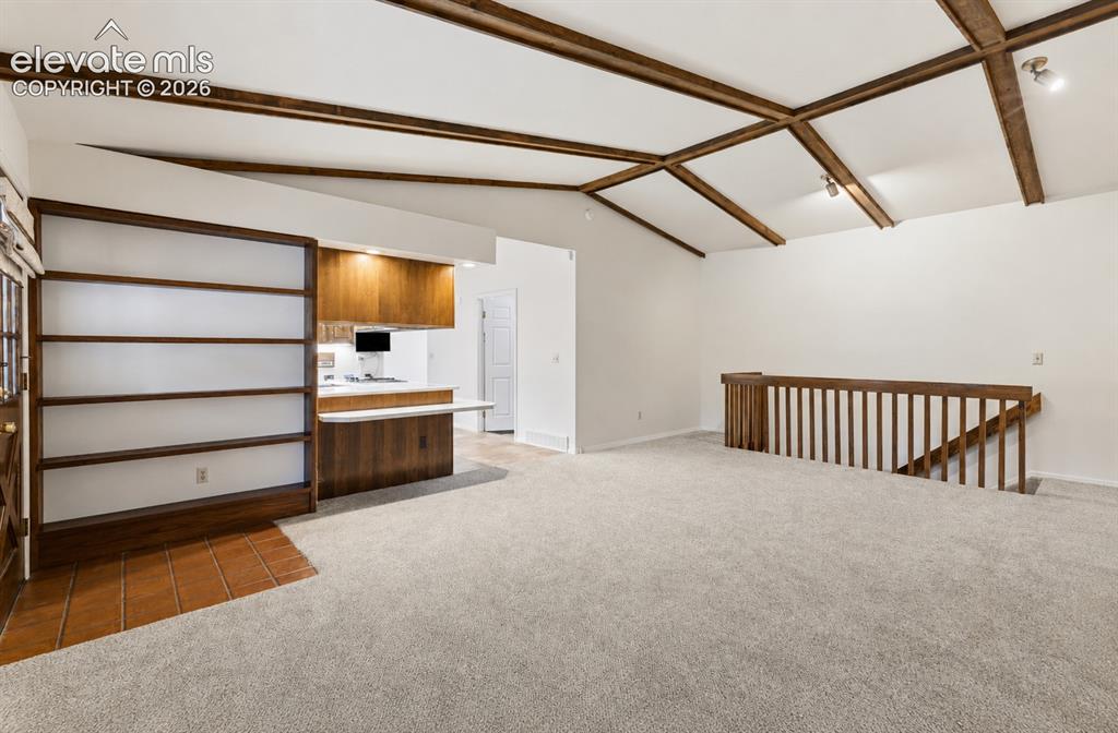 Image 14 of 38: Oh the style these beams can bring.