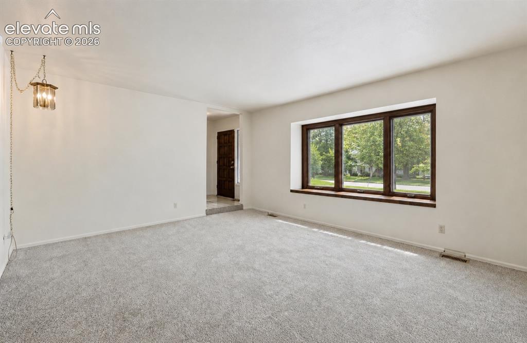 Image 9 of 38: Your TV and furniture will no doubt fit here 