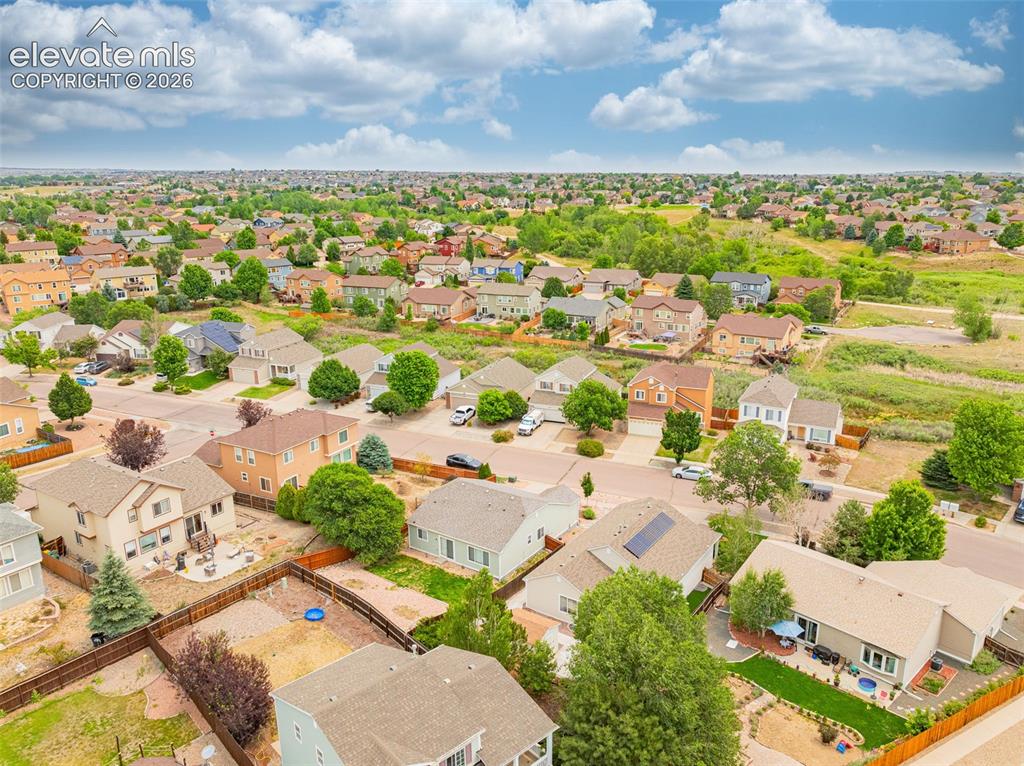 Image 41 of 49: Aerial perspective showcasing a residential neighborhood with varied archit