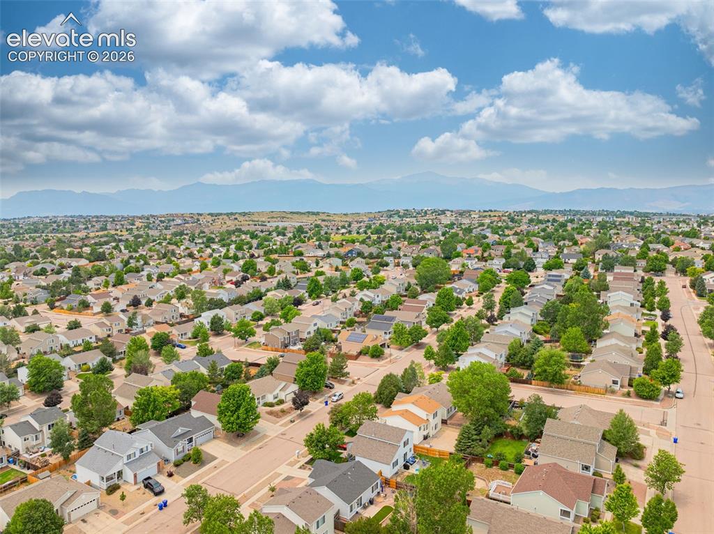 Image 43 of 49: Expansive residential community featuring a variety of architectural styles