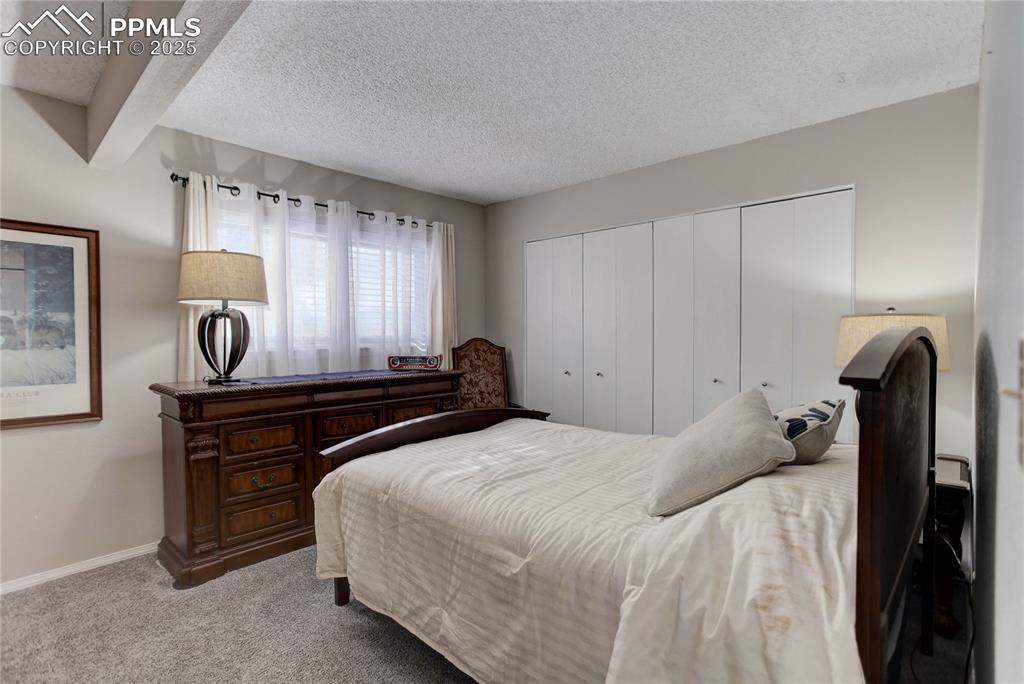 Image 11 of 25: Bedroom 1 w/ en-suite bath - main level