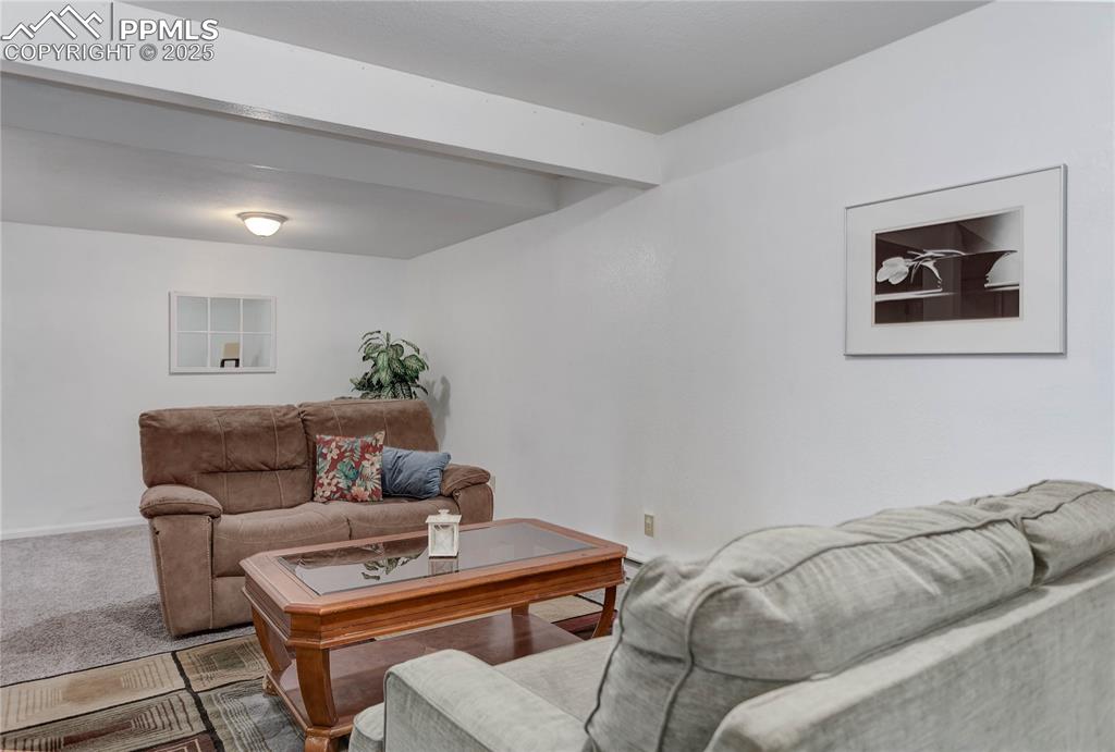 Image 18 of 25: Spacious family room in basement