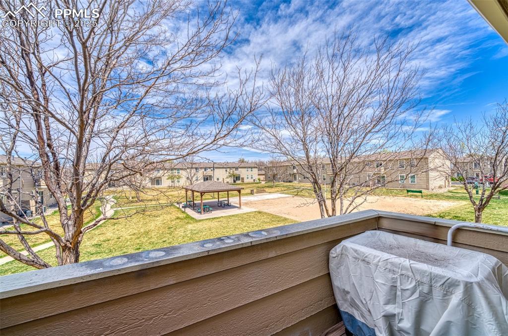 Image 19 of 23: Balcony with a residential view