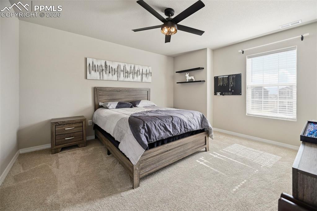 Image 33 of 39: Bedroom