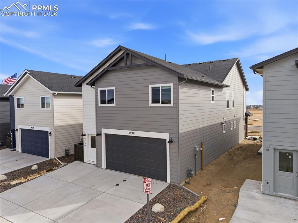 Image 48 of 50: Back of house and separate door access to the ADU