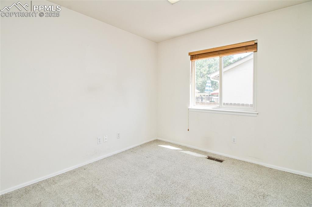 Image 29 of 38: 2nd bedroom