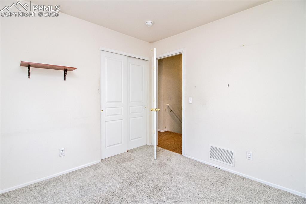 Image 31 of 38: 2nd bedroom
