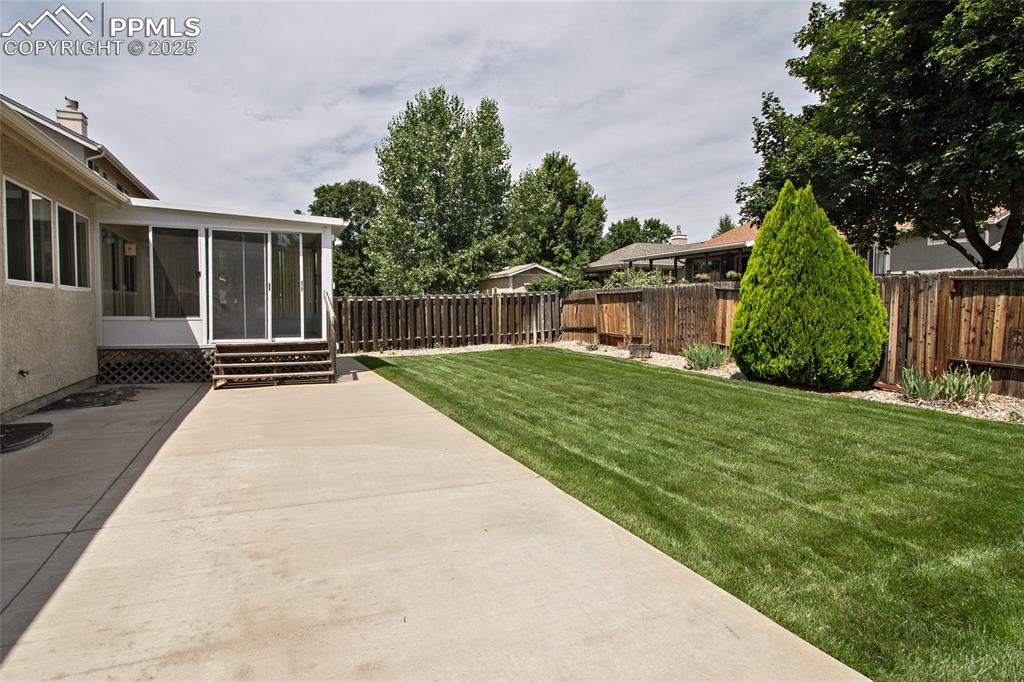 Image 6 of 38: Backyard patio
