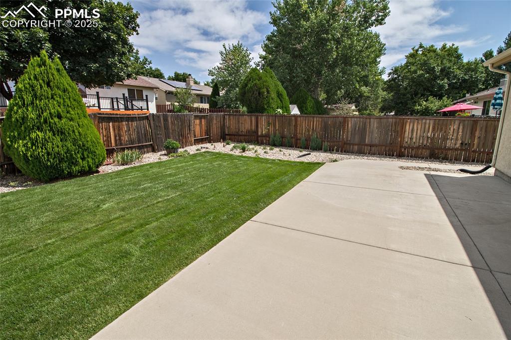 Image 7 of 38: Backyard patio