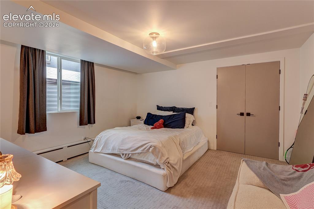 Image 50 of 50: Window with dark curtains, flush-mount ceiling light fixture, recessed ligh