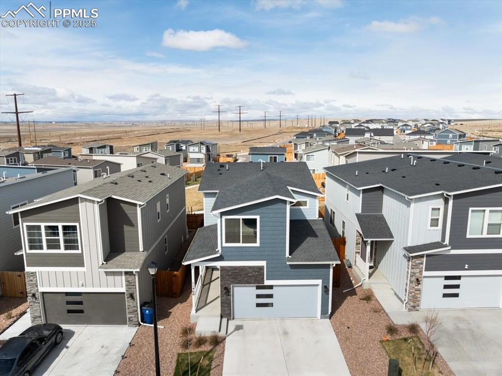 Image 2 of 26: Birds eye view of property featuring a residential view